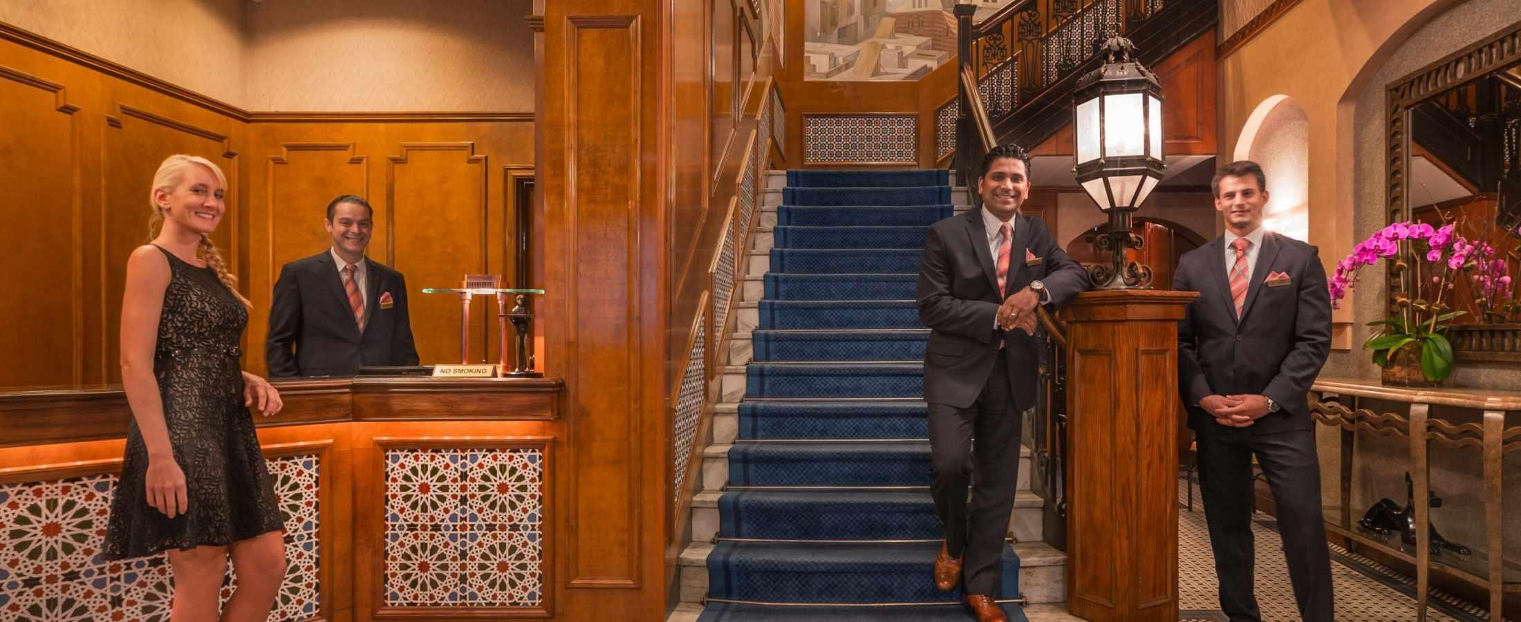 The team greeting guests at the main entrance of Casablanca Hotel.