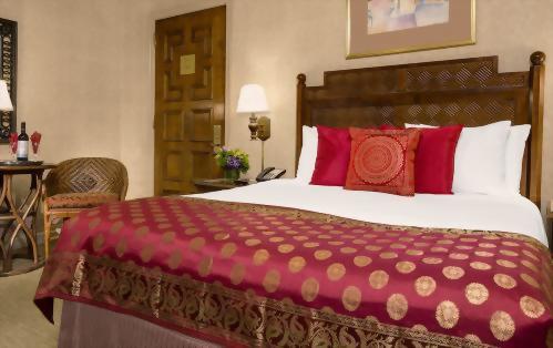 Our Deluxe Rooms with 1 Queen Sized bed have approximately 250 square feet total space.